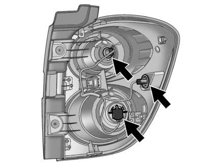 Chevrolet Equinox: Bulb Replacement. 6. Turn the bulb socket counterclockwise and pull it out.