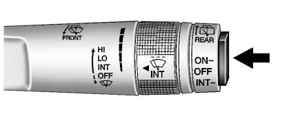 Chevrolet Equinox: Instruments andControls. ON: Press the upper portion of the button for continuous rear window wipes.