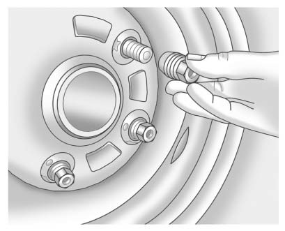 Chevrolet Equinox: Wheels and Tires. 9. Remove all of the wheel nuts.